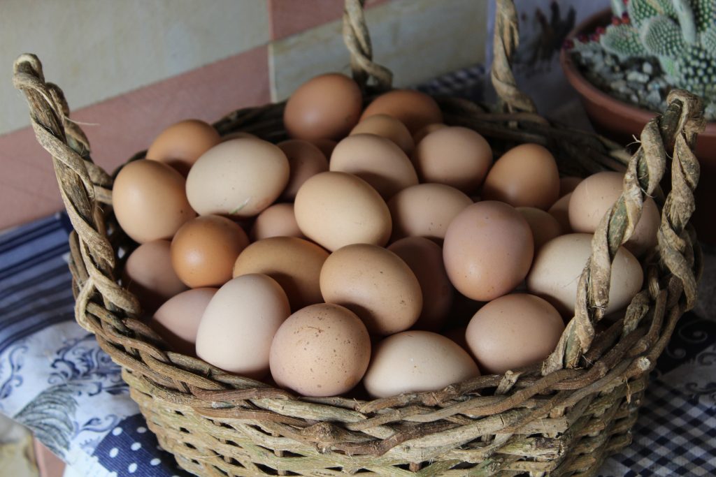 Brown eggs in a basket